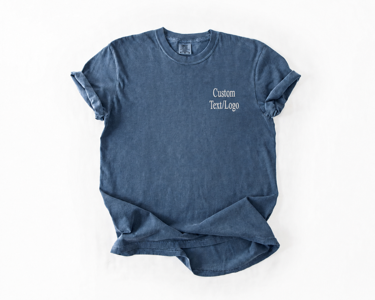 Embroidered t-shirt shown folded, logo detail