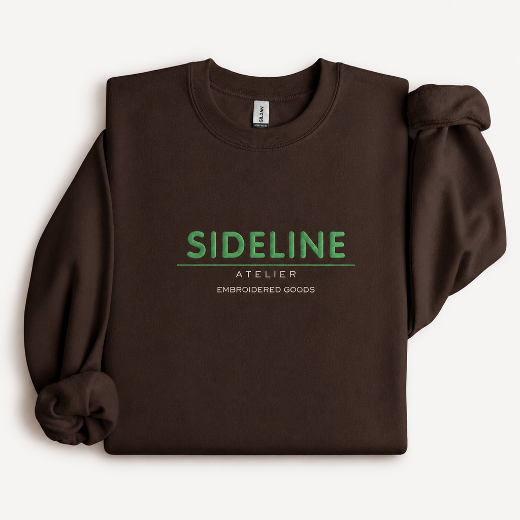 Custom embroidered Gildan 18000 heavy blend crewneck with a left-chest logo