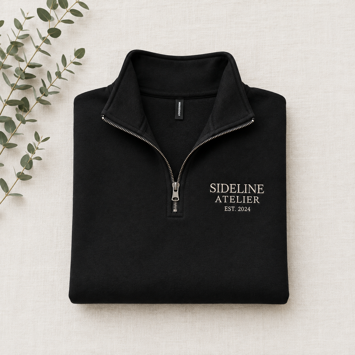 Custom embroidered quarter-zip pullover