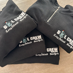 Custom SOL CREW embroidery on four dark quarter-zip pullovers