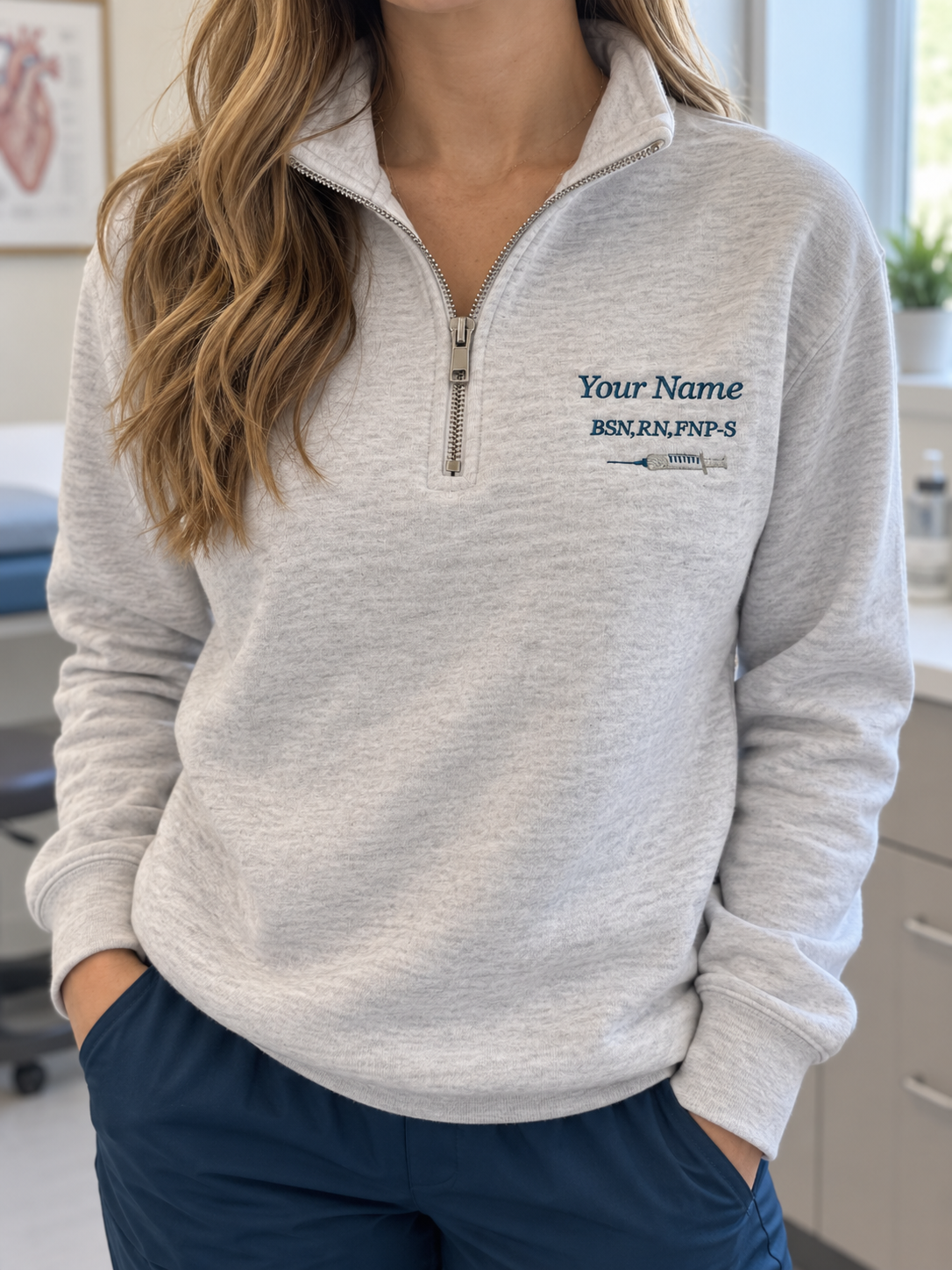 Woman wearing personalized embroidered nurse quarter-zip with syringe