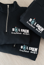 Custom SOL CREW logo embroidered on a dark quarter-zip pullover